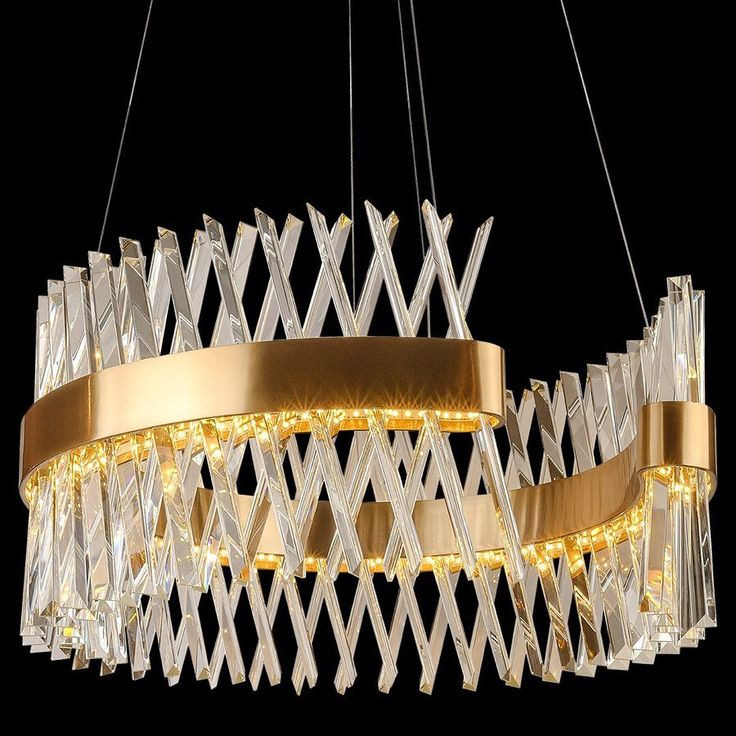 لوستر کریستالی مدرن طرح دایرهای طلایی، مناسب برای پذیرایی و اتاق خواب لوکس با کریستالهای آویزان هندسی.