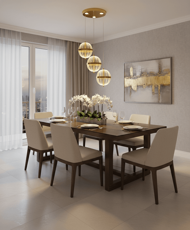 لوستر آویز مدرن سه شعله با حبابهای کریستالی شیاردار و بدنه طلایی بالای میز ناهارخوری.