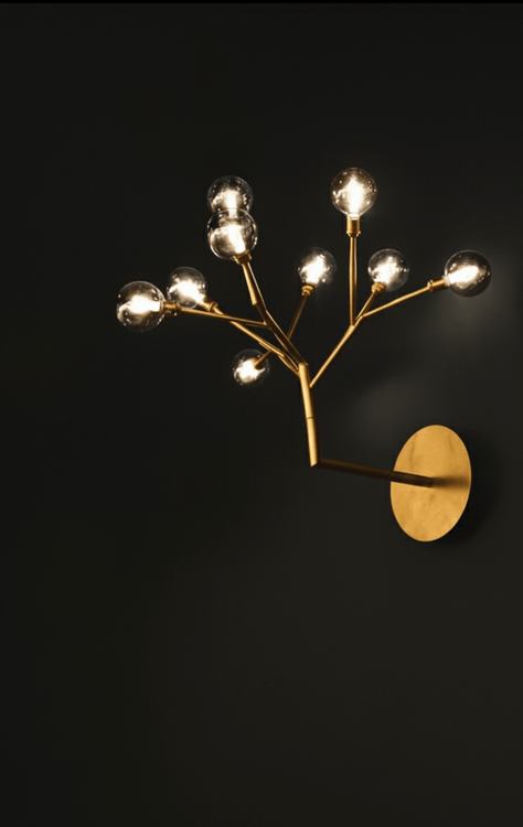 لوستر دیواری طلایی طرح شاخه با حباب شیشهای گرد شفاف و دودی